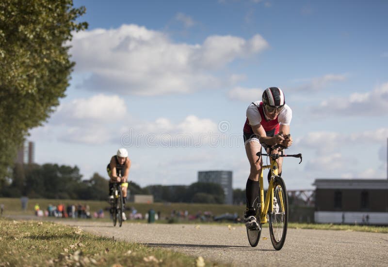 Fast cyclist in a time trial position royalty free stock photos Fast cyclist in a time trial position royalty free stock photos