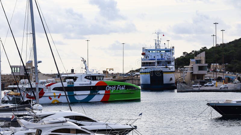 The fast ferry arri8ves in the harbor of Mgarr on the Mediterranean island of Gozo stock images