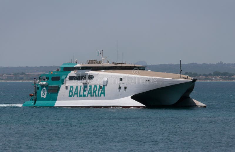 Fast ferry in mallorca arriving to port royalty free stock photos