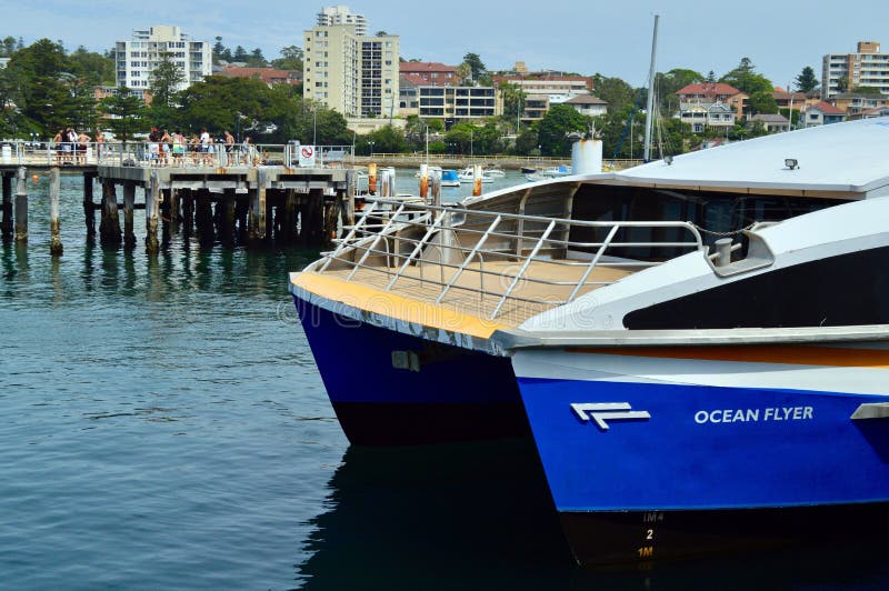 The fast ferry moors at Manly Wharf royalty free stock image