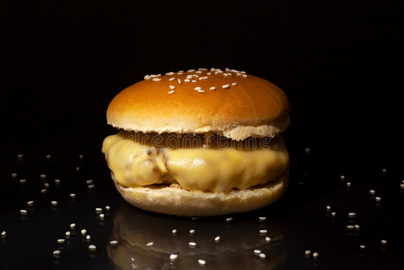 Fast food concept : hamburger with sesame seeds dark food photography royalty free stock photos Fast food concept : hamburger with sesame seeds dark food photography royalty free stock photos