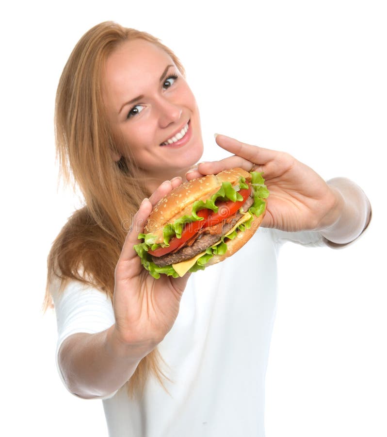 Fasta food pojęcie Kobiety przedstawienia hamburgeru smakowita niezdrowa kanapka zdjęcie royalty free Fasta food pojęcie Kobiety przedstawienia hamburgeru smakowita niezdrowa kanapka zdjęcie royalty free