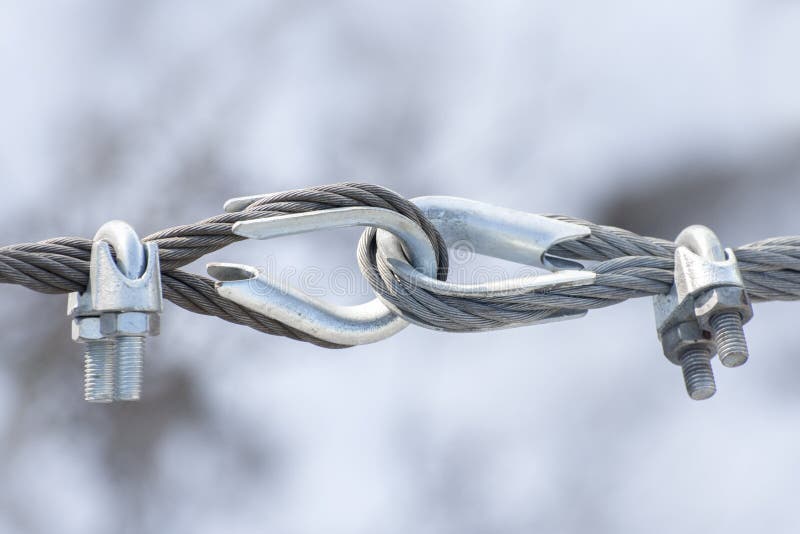 Fastening of two iron cables with thimble swivel stock image