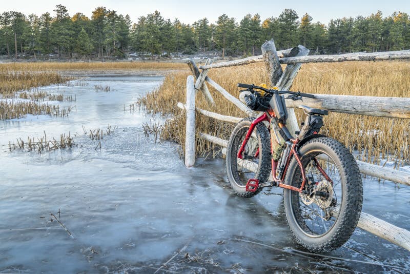 Fat bike on icy stream in Rocky Mountains