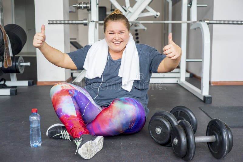 Fat girl in a gym stock image. Image of chubby, exercise 101374467
