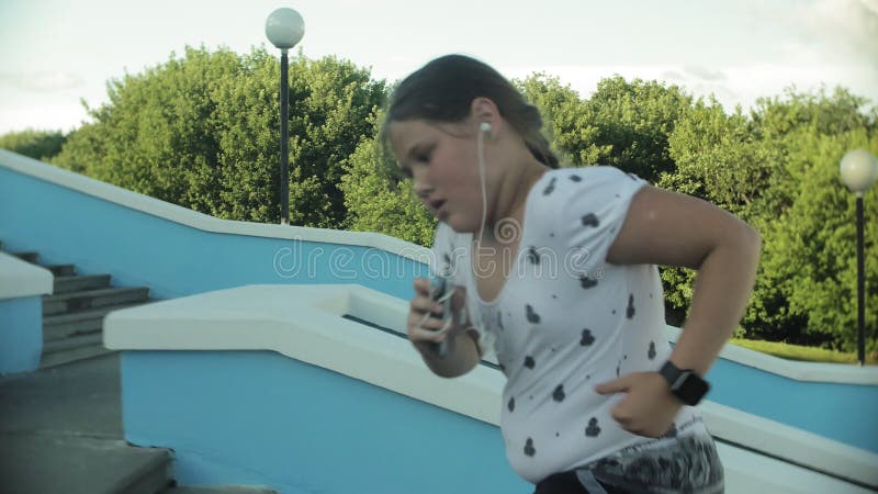 A Fat Girl Running Around To Climb the Stairs Stock Footage - Video of health, background: 122767332
