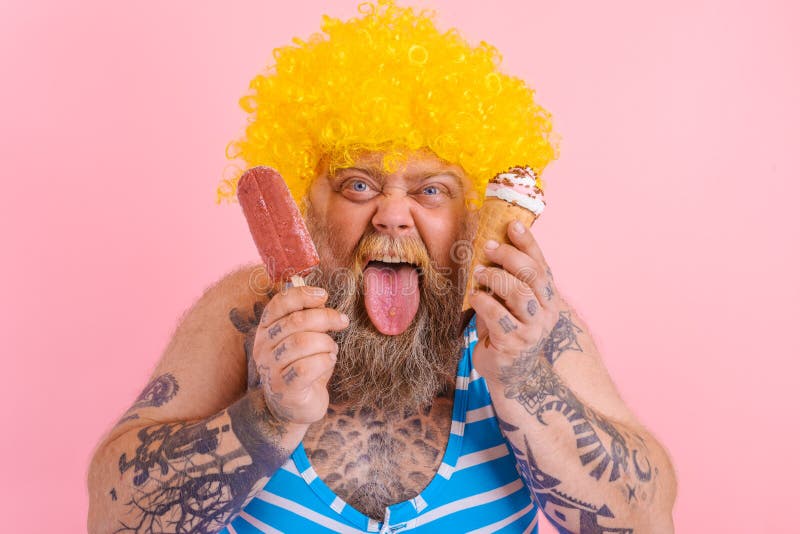 Fat man with beard and wig eats a popsicle and an icecream