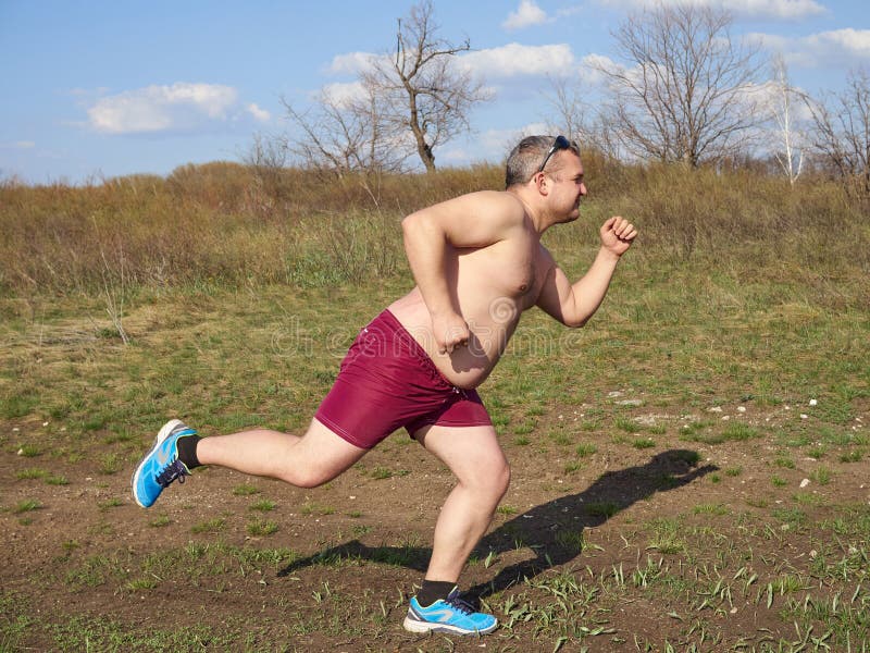 fat guy running shirtless