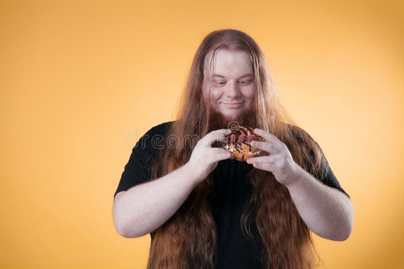 A Fat Red-haired Man is Holding a Large Delicious Cake. Stock Image - Image of great, male: 127683351 A Fat Red-haired Man is Holding a Large Delicious Cake. Stock Image - Image of great, male: 127683351