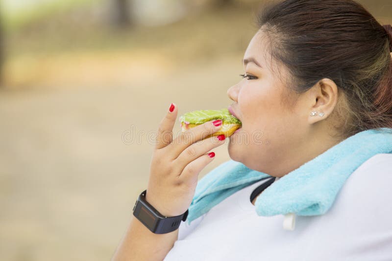 Adult gallery - Fat woman eating donuts donuts Fat woman eating