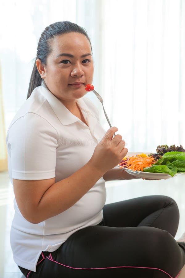 Fat woman eating salad stock photo. Image of salad, dieting 37525838