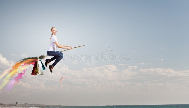 Fata zboară pe mătură royalty free stock photo