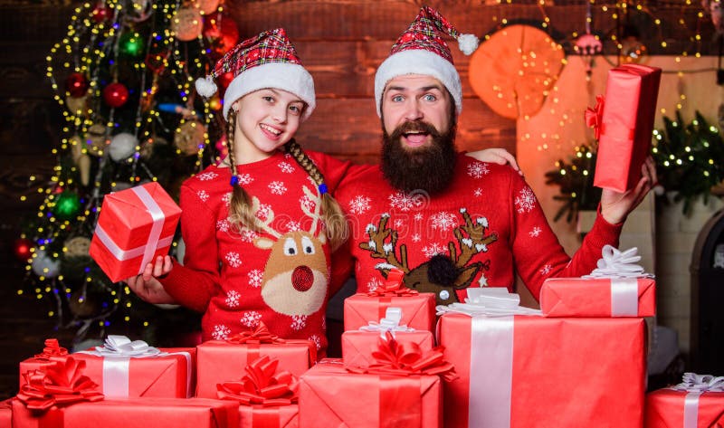 Father bearded man and daughter near christmas tree. Gifts for nearest. Spend time with your family. Dad and child