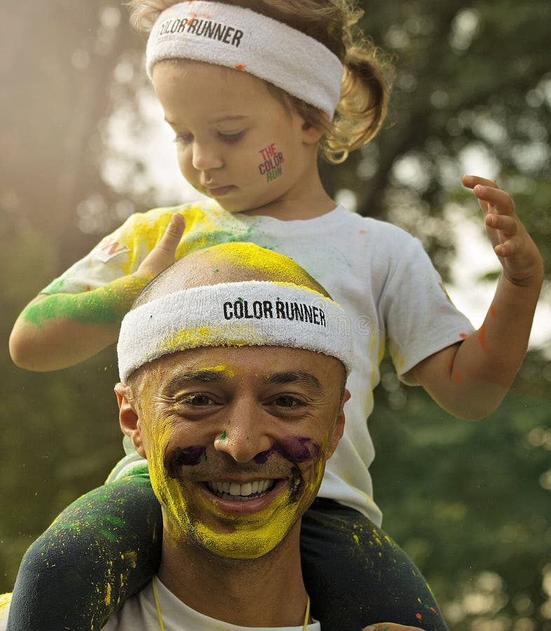 Father and Daughter at Color Run Bucharest stock photos Father and Daughter at Color Run Bucharest stock photos