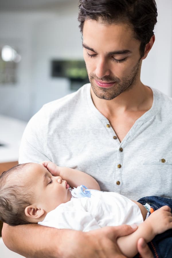 Father Carrying Sleeping Baby Stock Photo Image of leisure, abode