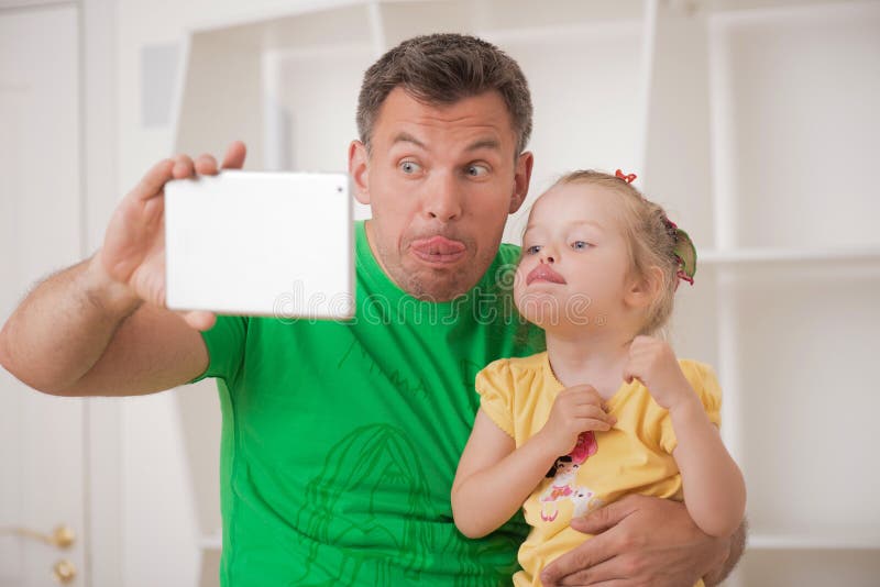 Download Father And Child Using Electronic Tablet At Home Stock Image - Image of people, happiness: 43298721