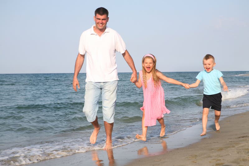 Father with children at the beach