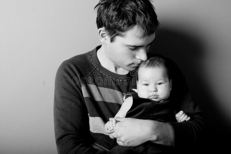 Father and daughter. Loving father with his baby daughter B&W Father and daughter. Loving father with his baby daughter B&W