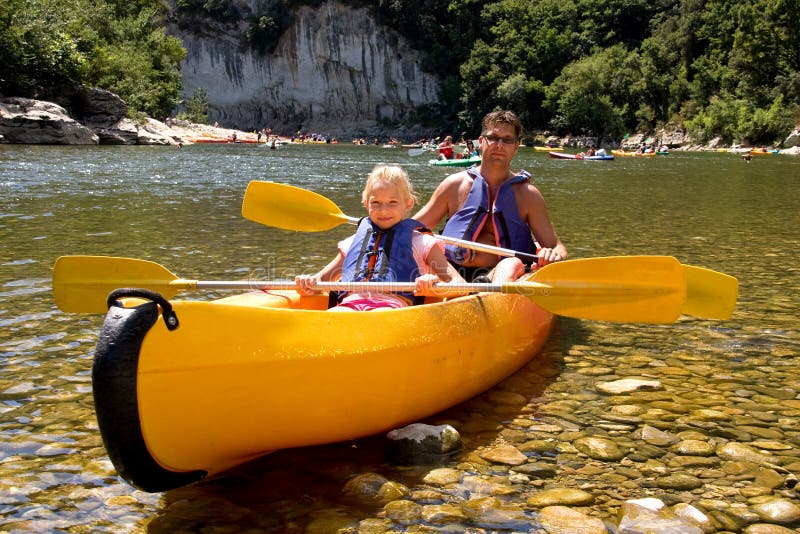 Father and daughter in canoe