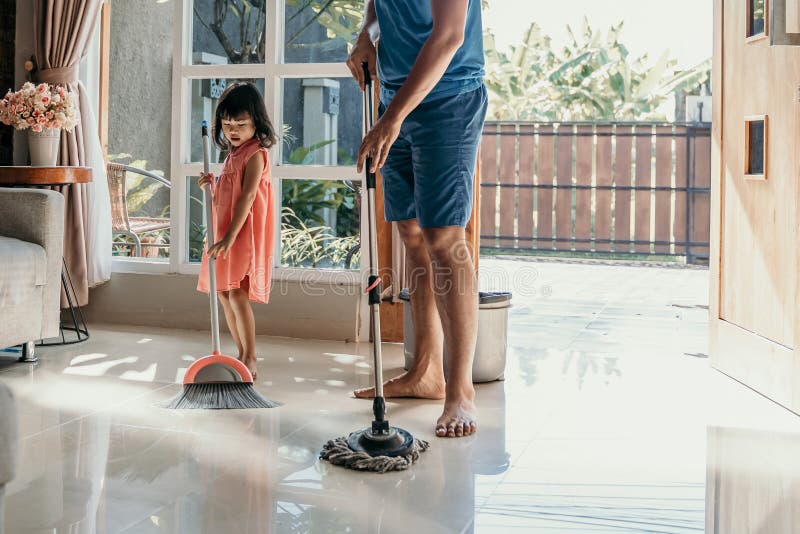 Father Boy Child Sweeping Mess Family Cleaning Together Help Broom Stock  Photo by ©PeopleImages.com 653791010