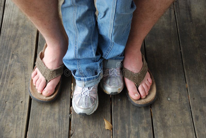 Father and daughter feet