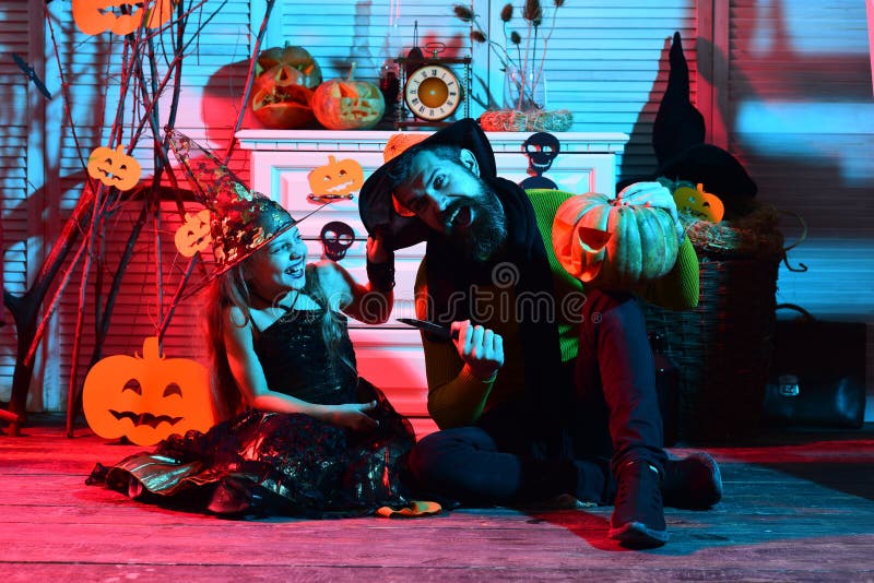 Father and daughter with Halloween decor. Halloween party stock images Father and daughter with Halloween decor. Halloween party stock images