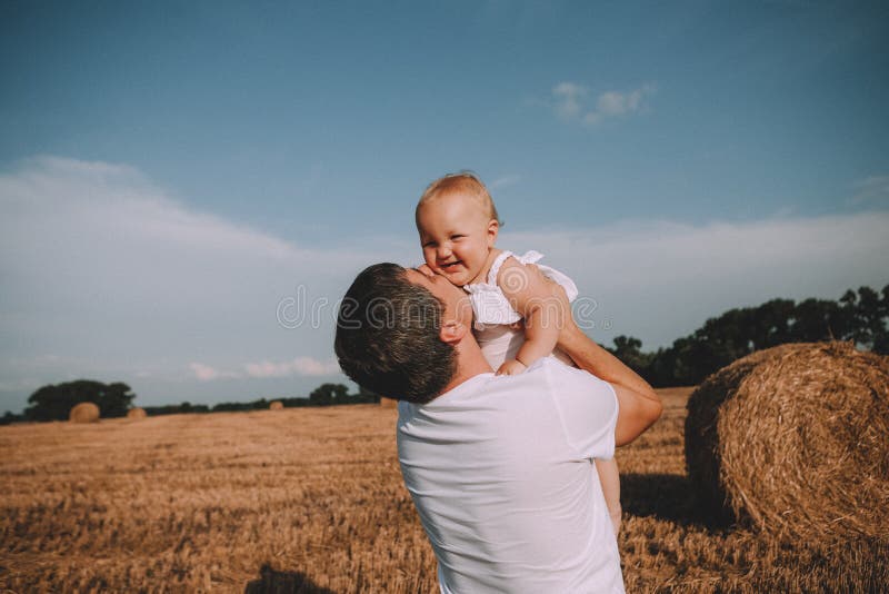 Father daughter joy game toss up baby field