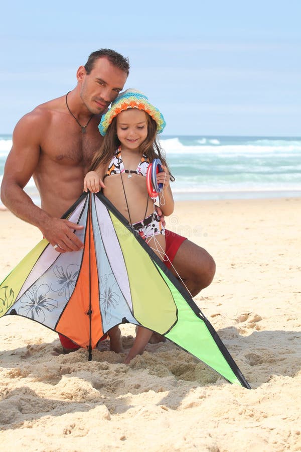 Father and daughter with kite royalty free stock photo Father and daughter with kite royalty free stock photo