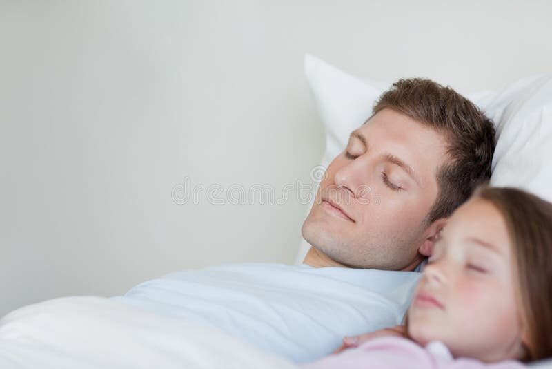 Father and Daughter Taking a Nap Stock Image Image of bedclothes