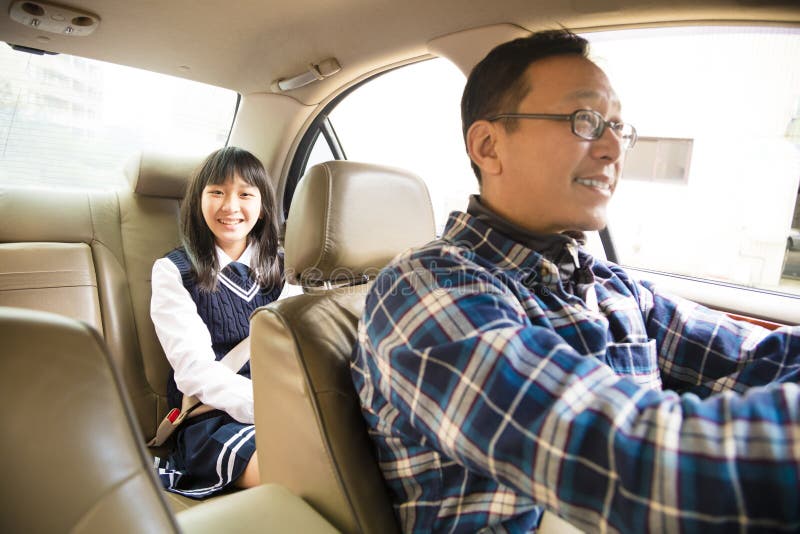 Father driving to school with teen daughter royalty free stock image Father driving to school with teen daughter royalty free stock image
