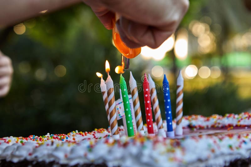 Father hand lights candles stock photography Father hand lights candles stock photography