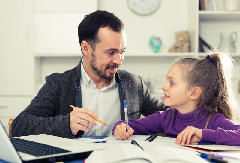 dad helping kid with homework