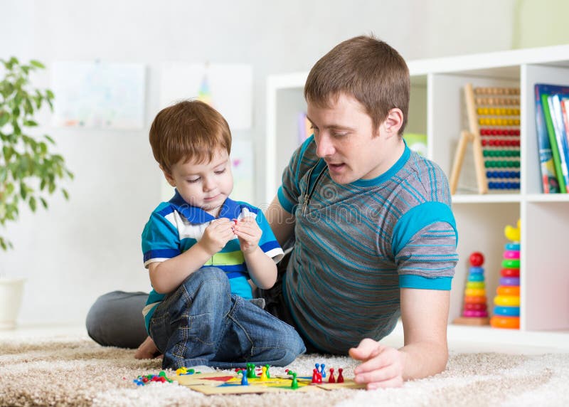 Father with his child girl play together royalty free stock images Father with his child girl play together royalty free stock images