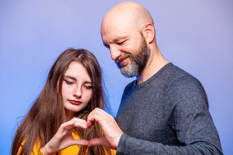 girl and bald guy