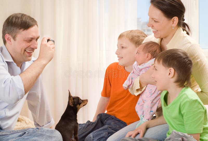 Father photographing family