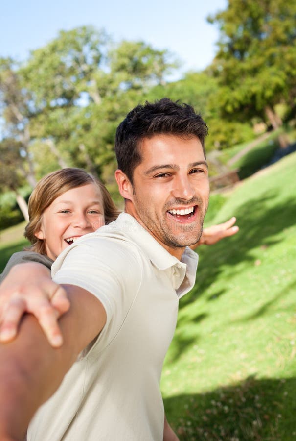 Father Playing With His Son Stock Image - Image of hill, light: 18740471