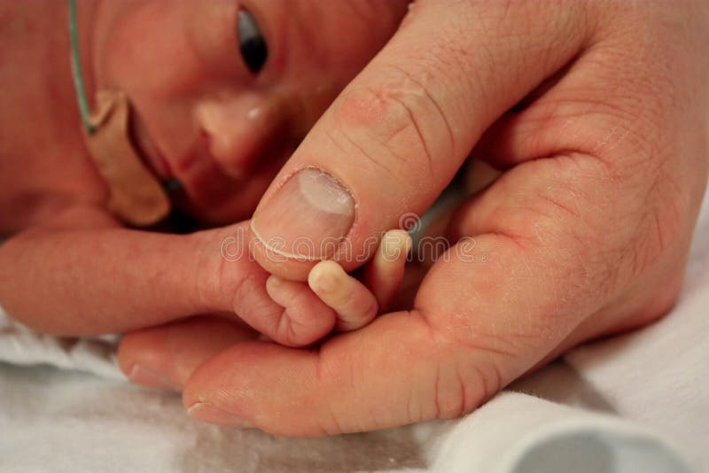 Father and premature baby