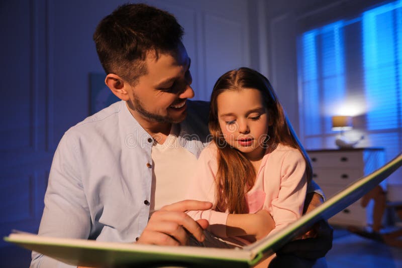Father Reading Bedtime Story To Daughter At Home Stock Image Image Of Little Daughter 225067781