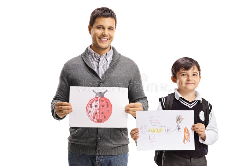 Father and schoolboy holding drawings and smiling stock images Father and schoolboy holding drawings and smiling stock images