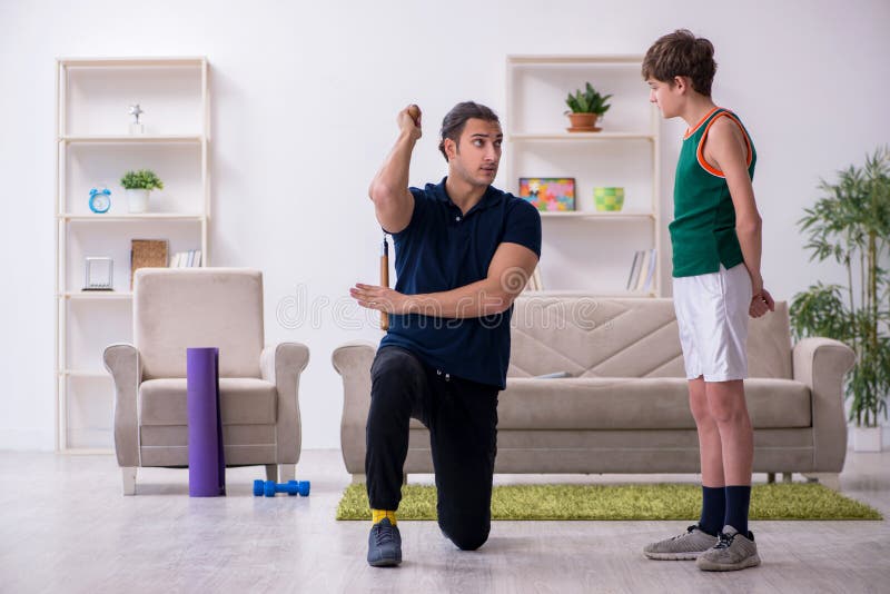 Father and Son Doing Sport Exercises Indoors Stock Image - Image of ...