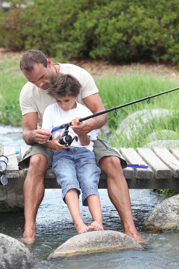 Father and son fishing stock photo. Image of share, children - 35739702