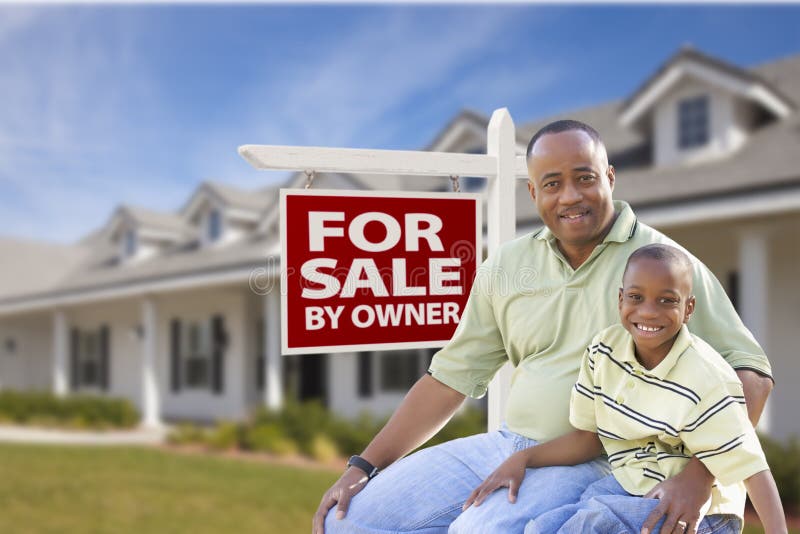 Father and Son In Front of For Sale By Owner Sign and House stock images Father and Son In Front of For Sale By Owner Sign and House stock images