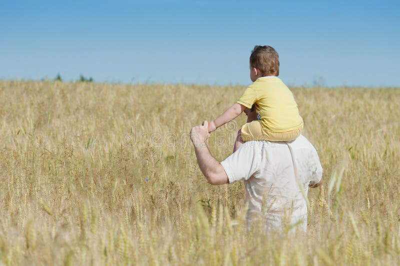 Father And Son Going In The Field Stock Image Image of nature, fresh