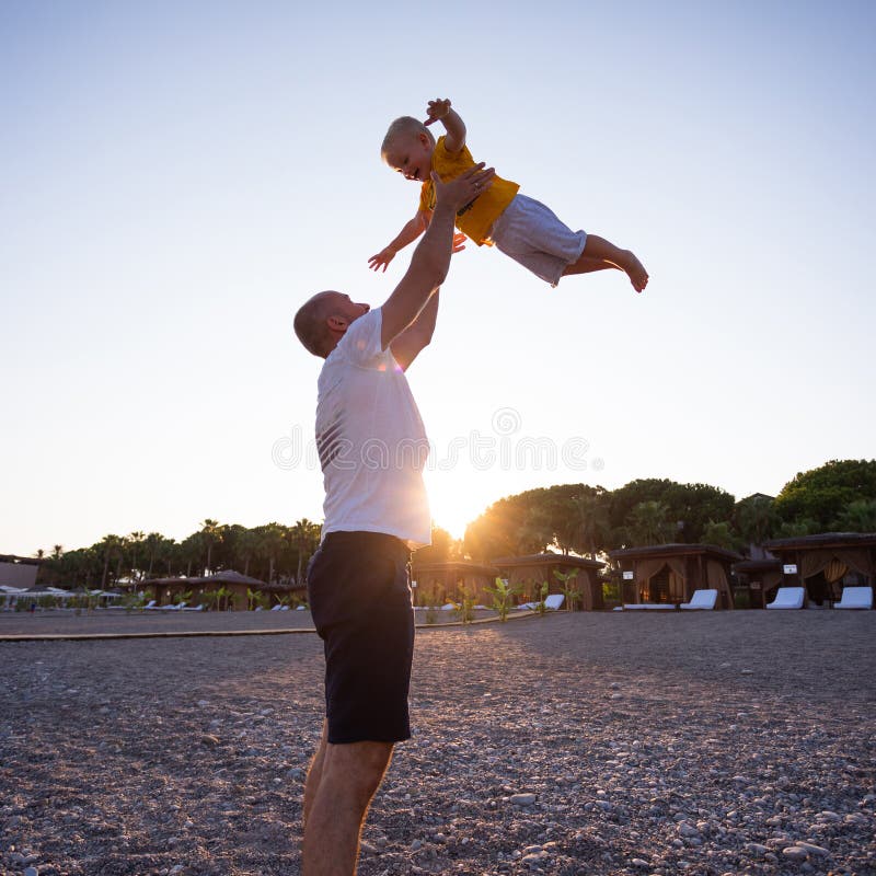 Father And Son Having Fun On The Beach At Sunset Stock Image Image Of Happiness Summer 169361255