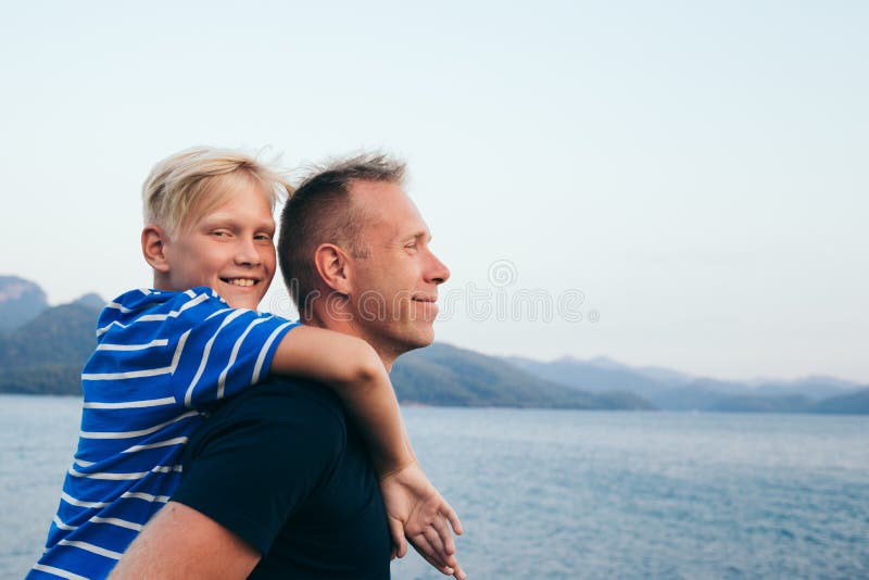 Father and son hugging.