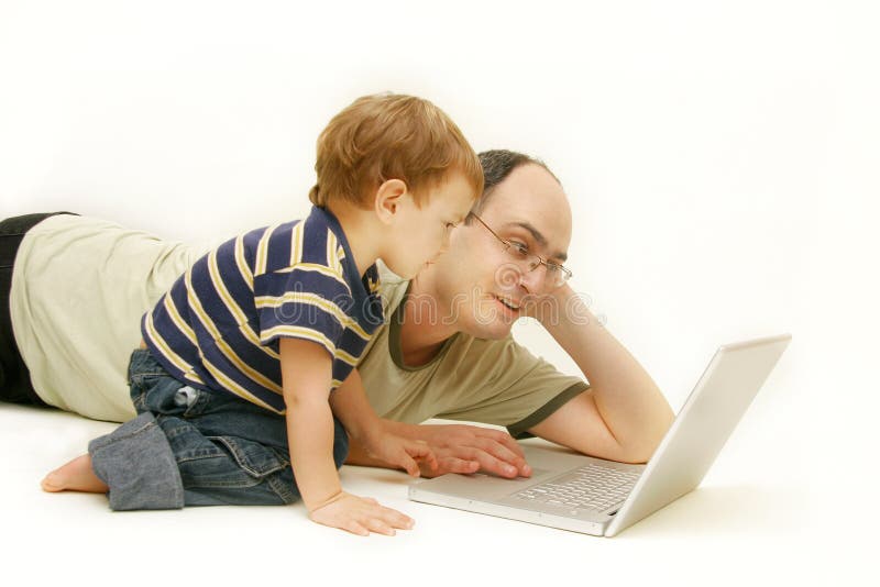 Father and son with laptop