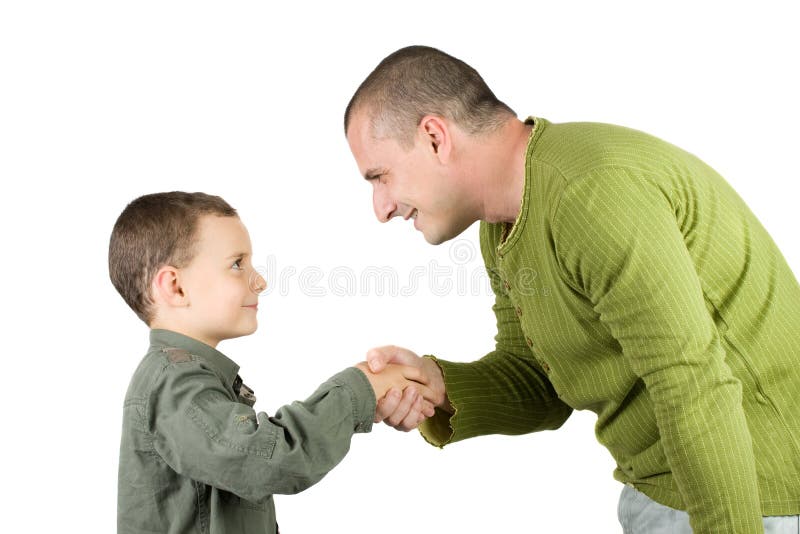 Father and son shaking hands