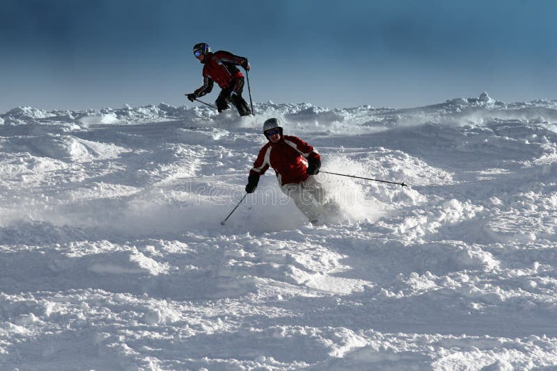 Father and son skiing