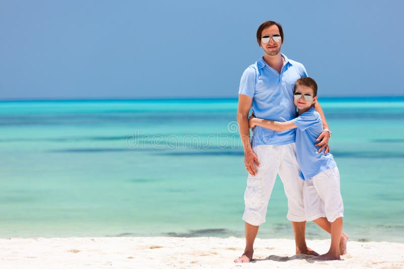 Father and son on vacation stock photo. Image of ocean 40163998