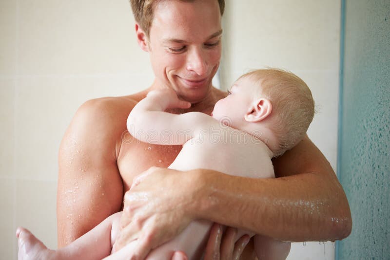 Father Taking Shower With Baby Son.